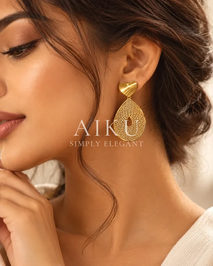 Aurelia Gold Plated Teardrop Earrings worn by a model