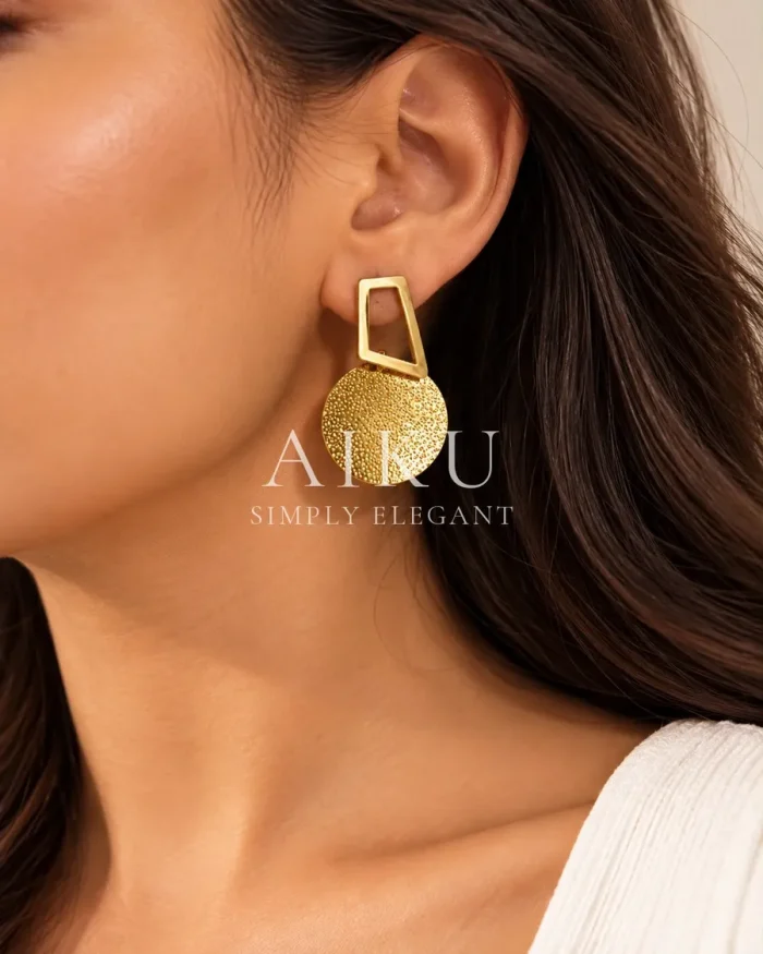 Geometric Circle Drop Earrings worn by a model