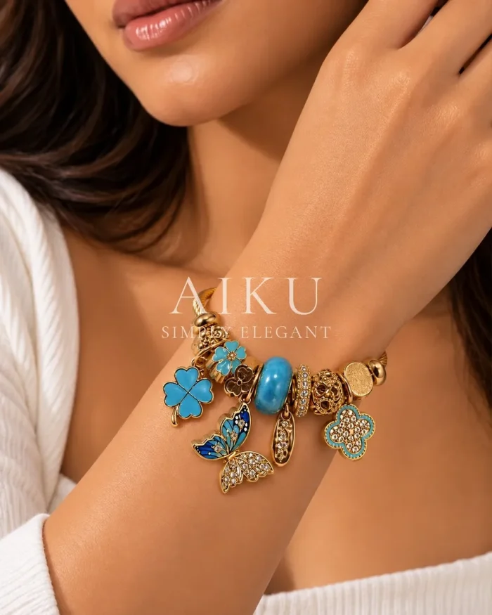 Blue Butterfly Charm Cuff Bracelet worn by a model