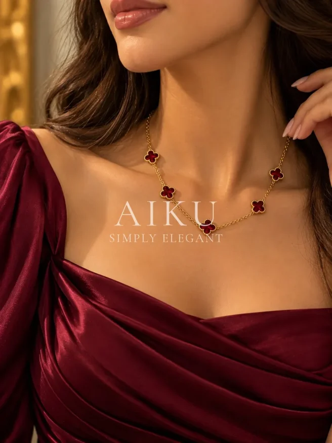 Maroon Clover Necklace worn by a model